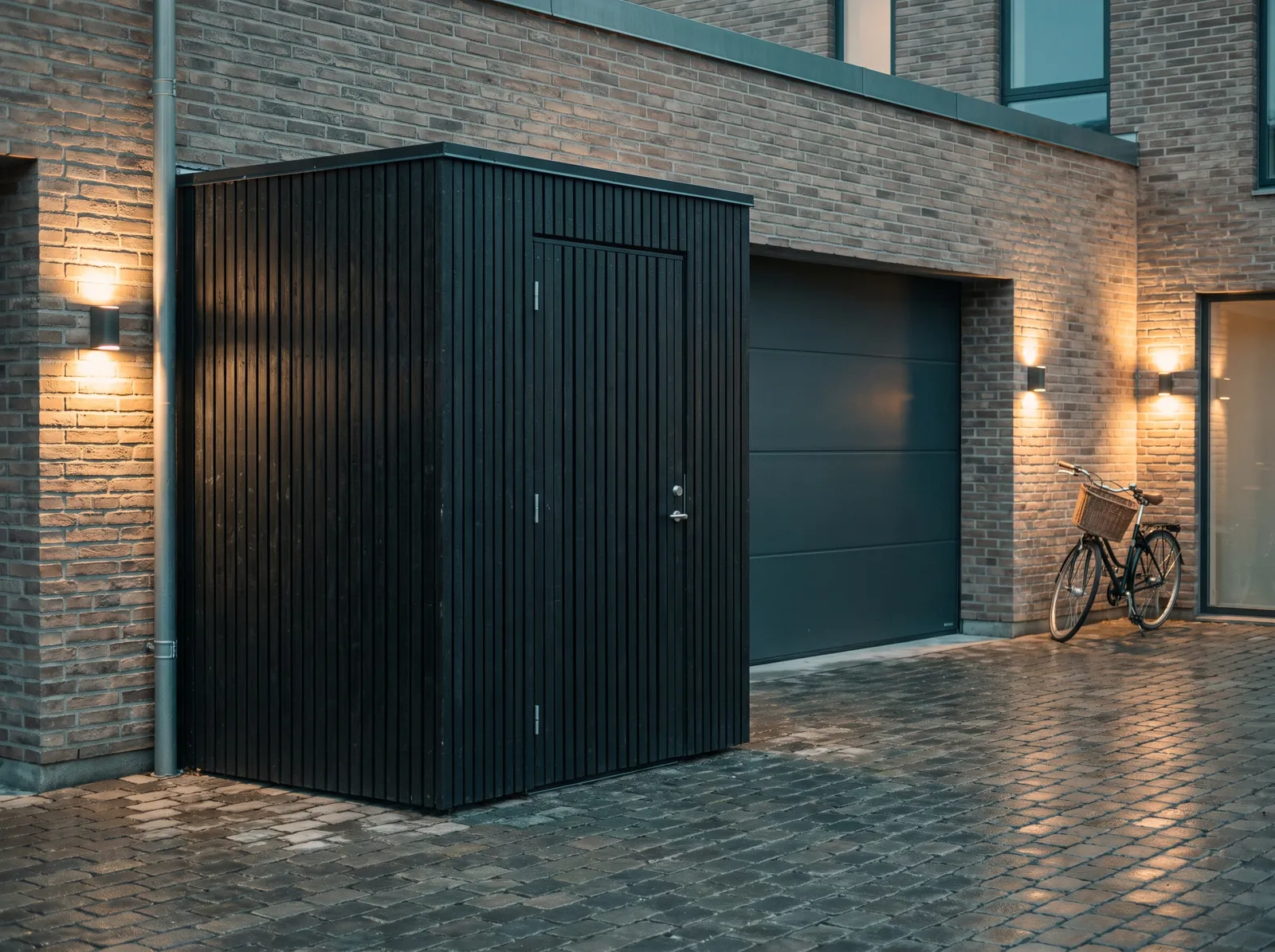 A timber bin store beside a garage door in a residential courtyard